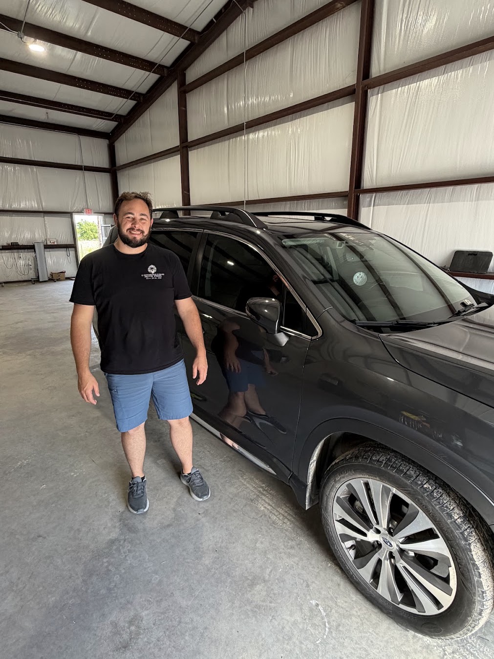 Stephen Zenzen, owner of Cornerstone Auto Pros, at the Denton County hail repair shop in Krum, TX