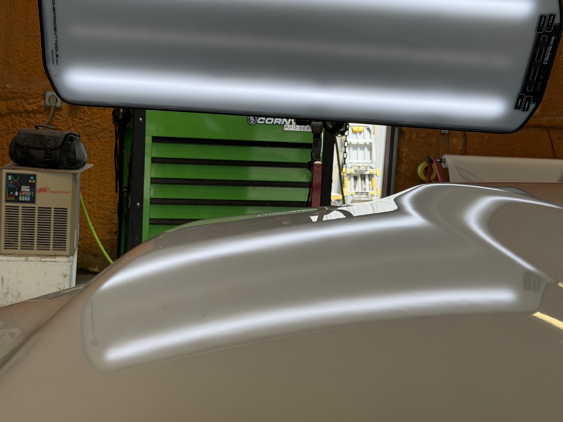 Same panel after paintless dent repair